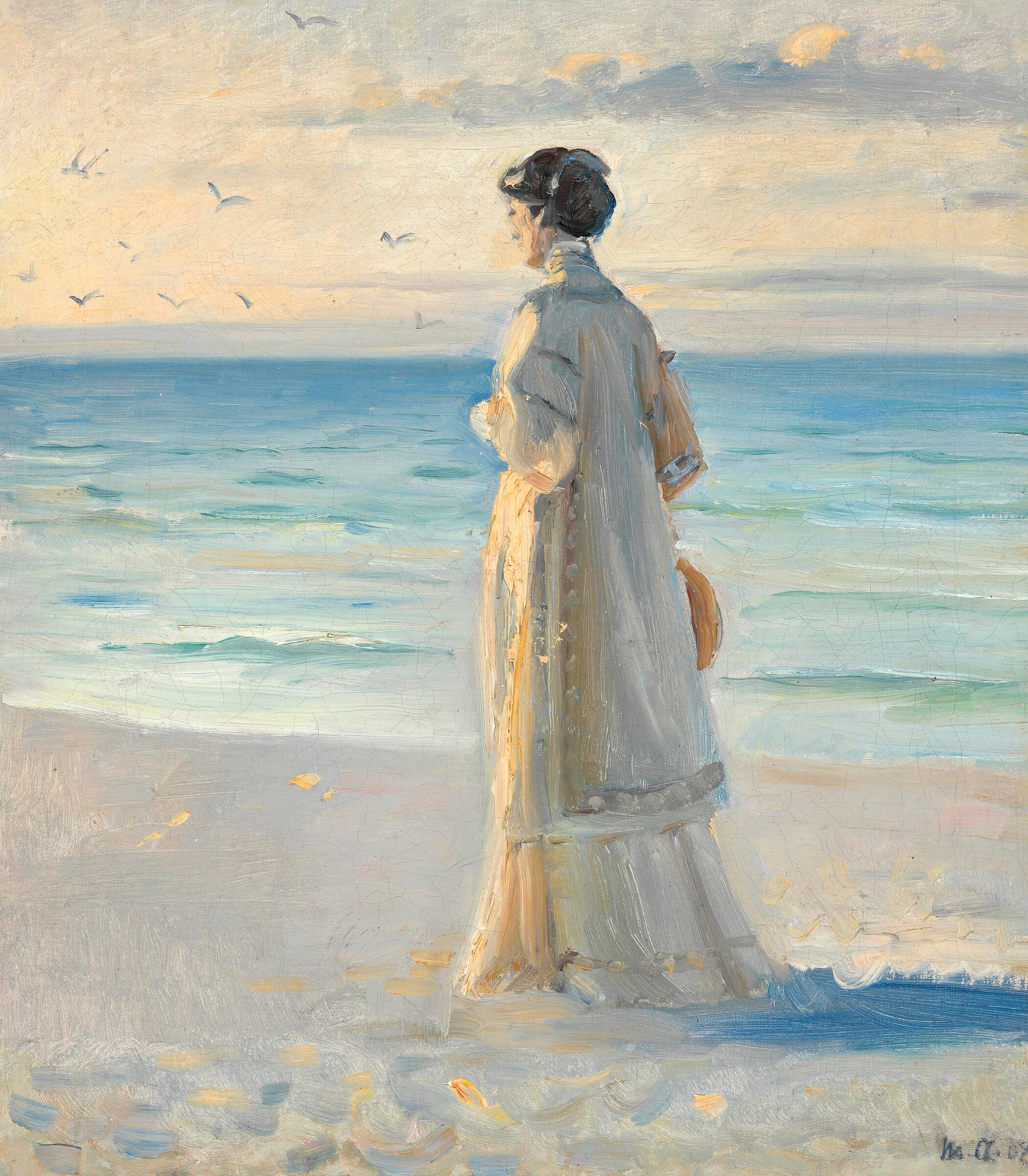 Une femme vêtue d’une longue robe d’été légère contemple la mer sur la plage de Skagen. - Michael Peter Ancher - Alpha