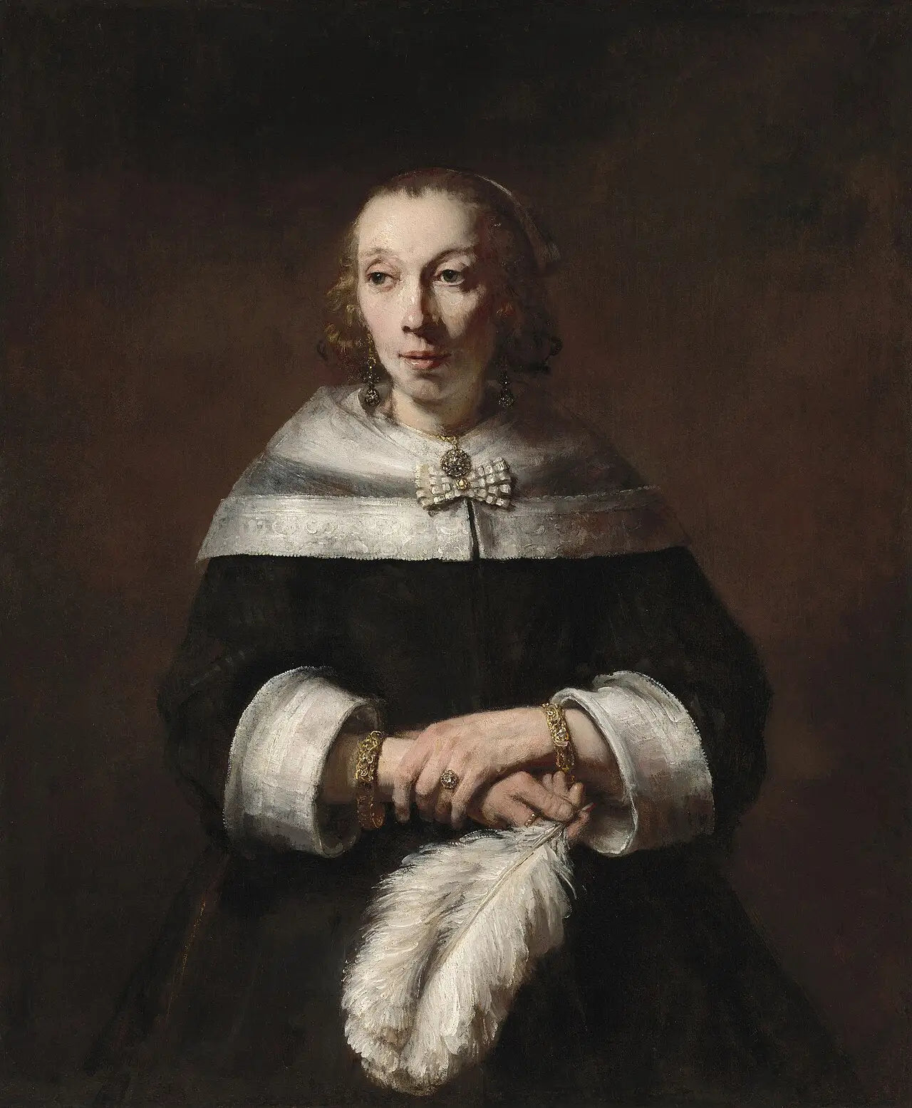 Reproduction du tableau « Portrait d'une femme avec un éventail en plumes d'autruche - Rembrandt » par Alpha Reproduction en peinture à l’huile