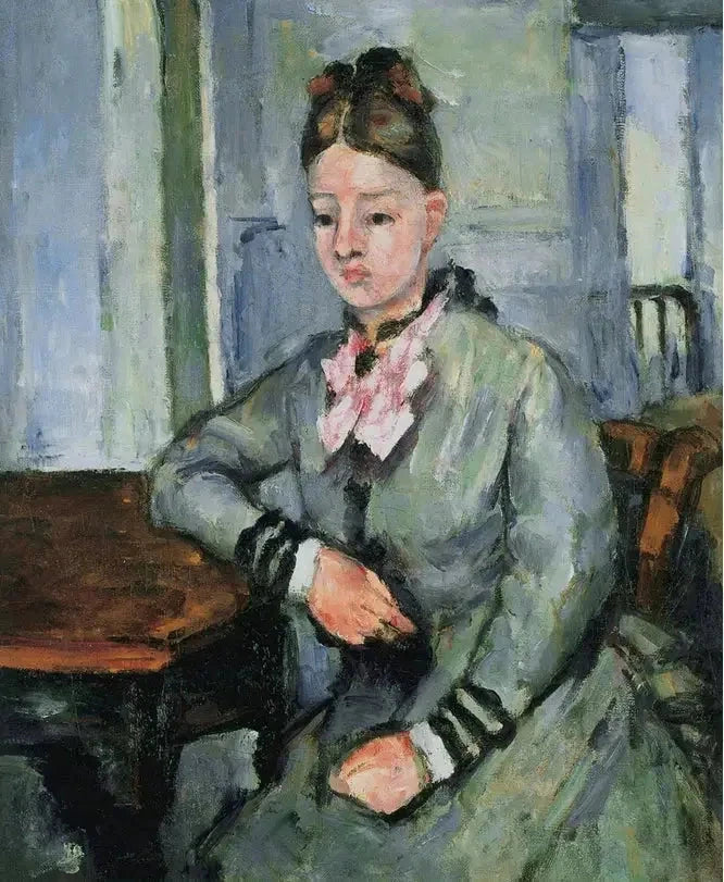Madame Cézanne lent mot bordet - Paul Cézanne