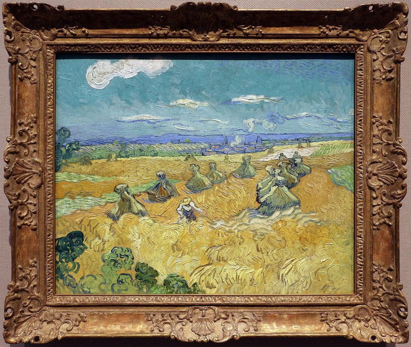 Hveteåker med bunter og tresker - Vincent van Gogh
