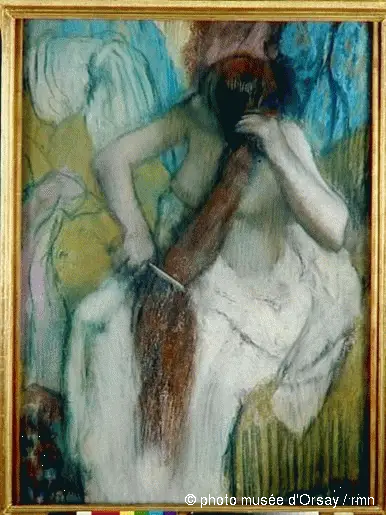 Kvinne som ordner håret - Edgar Degas