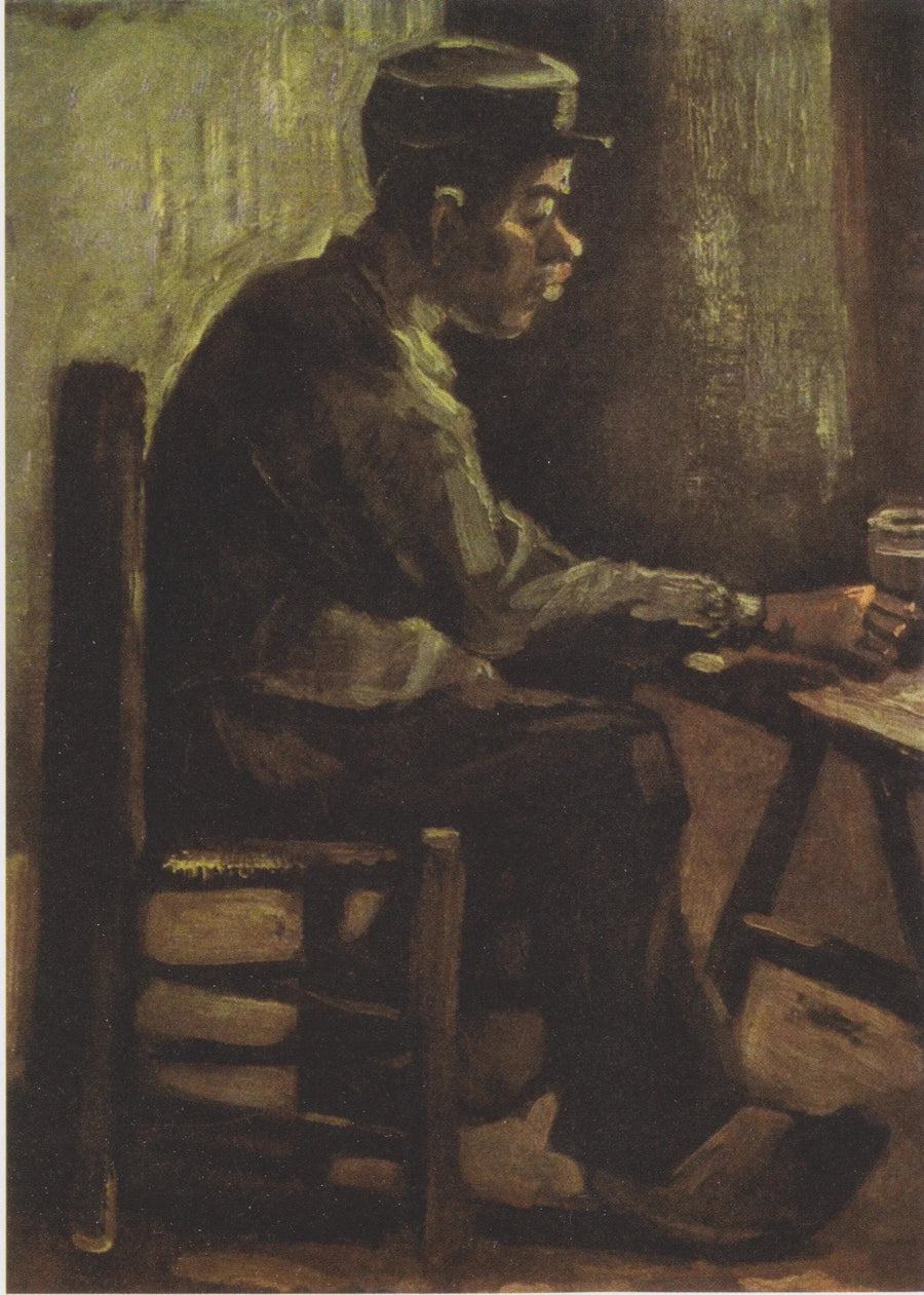 Mann ved et bord - Vincent van Gogh