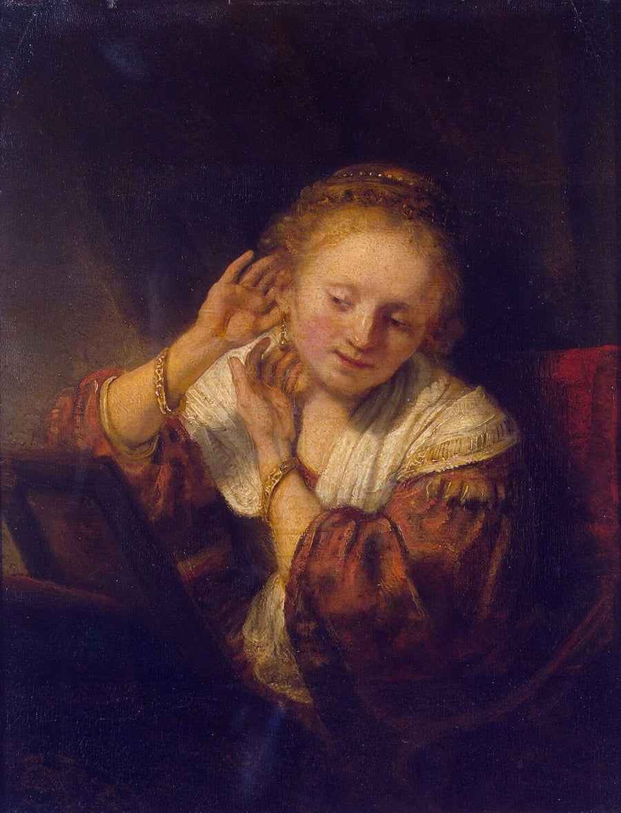 Ung kvinne med øredobber - Rembrandt