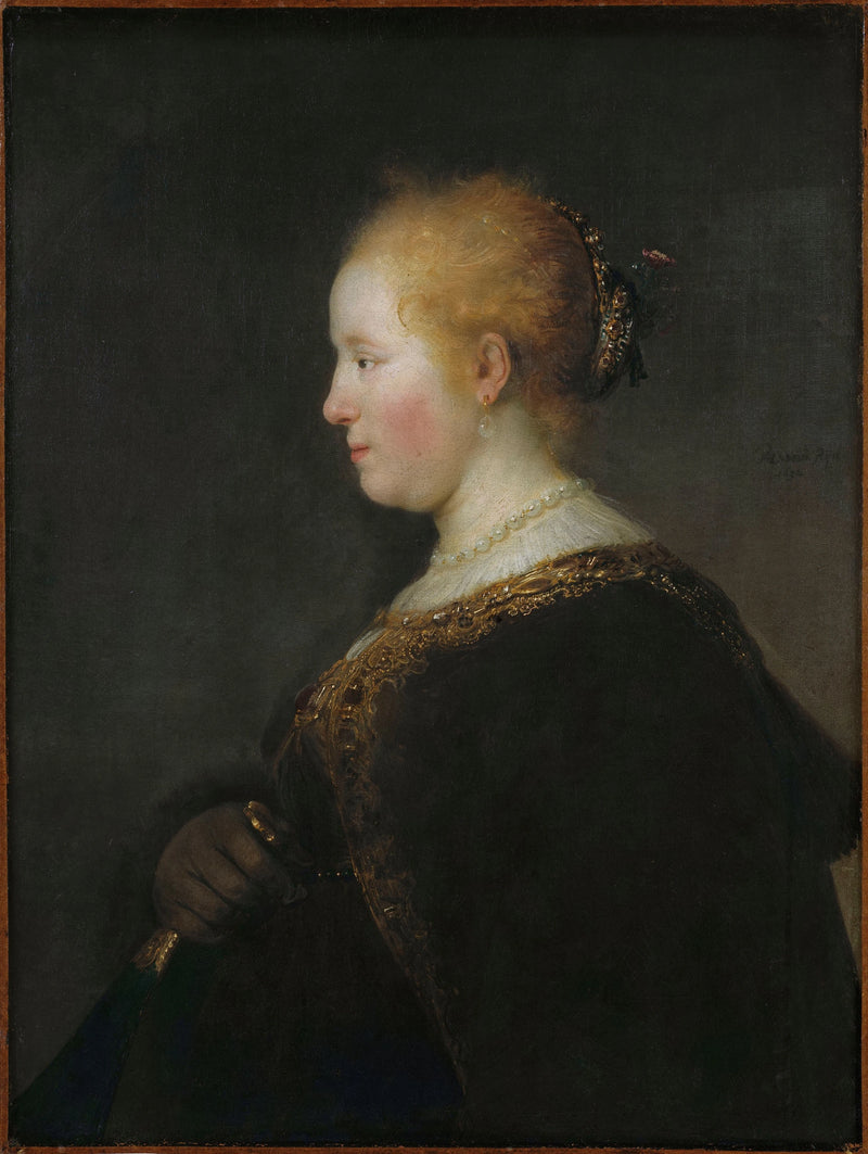 Dame som holder en vifte - Rembrandt