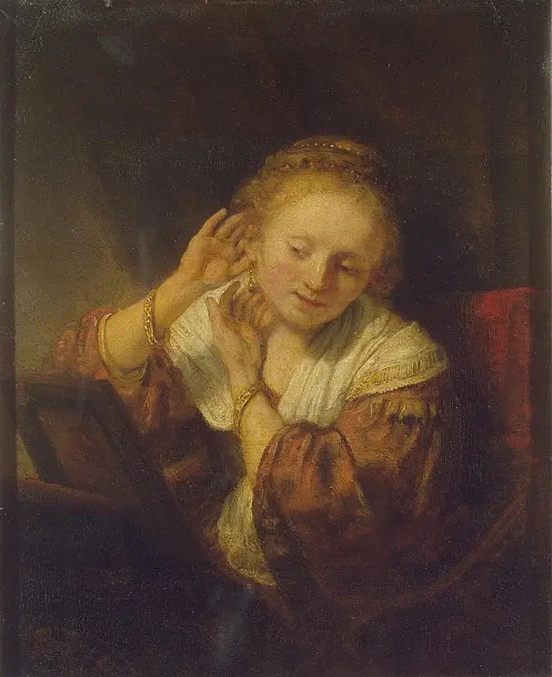 Ung kvinne med øredobber - Rembrandt
