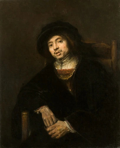 Portrett av en ung mann i en stol - Rembrandt