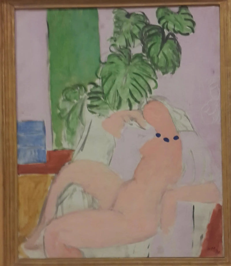 Nå i en stol, grønn plante - Henri Matisse