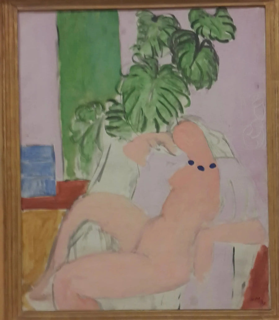 Nå i en stol, grønn plante - Henri Matisse