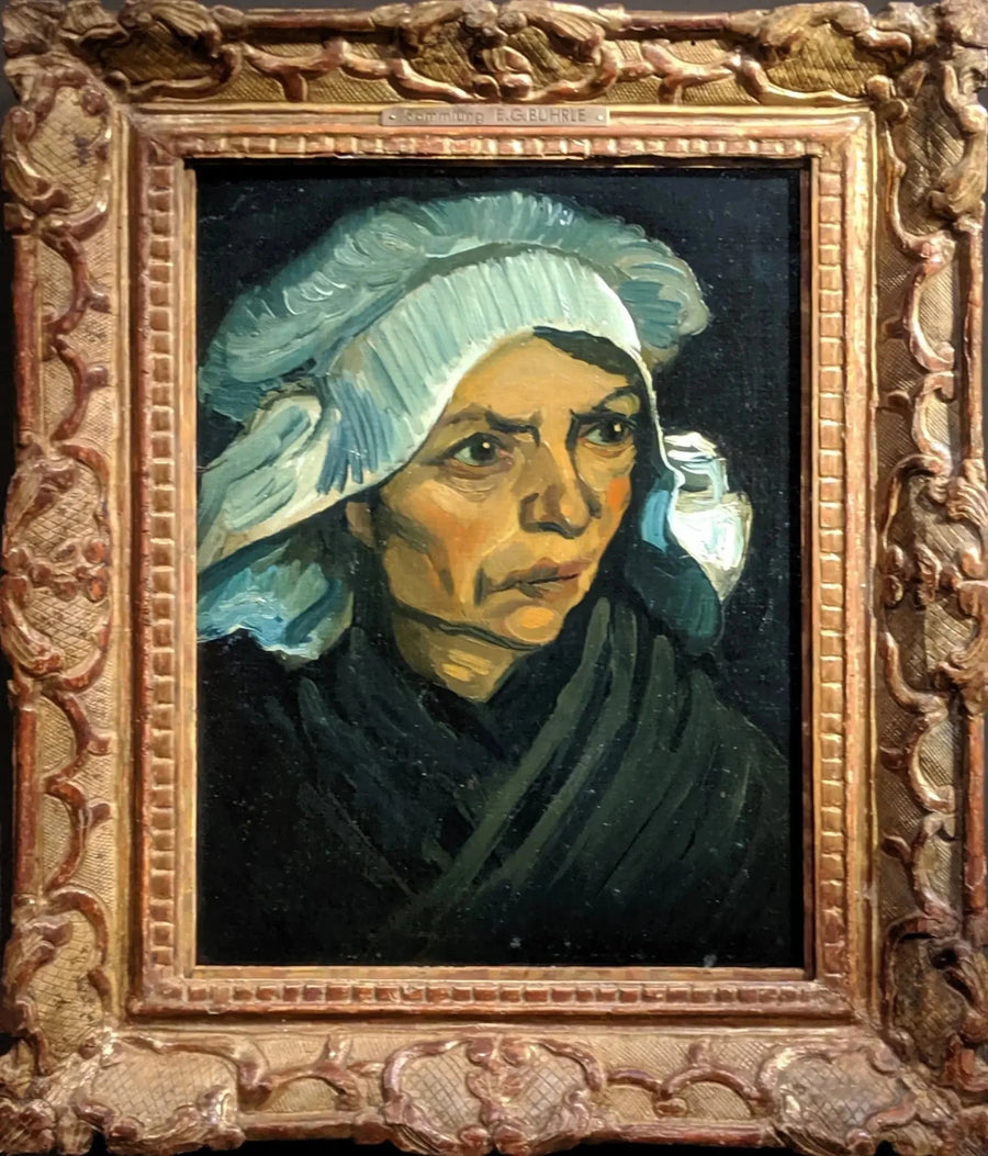 Bondekvinnehode med hvit lue - Vincent van Gogh