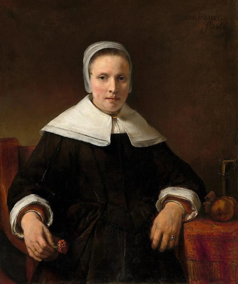 En kvinne som holder en rose - Rembrandt